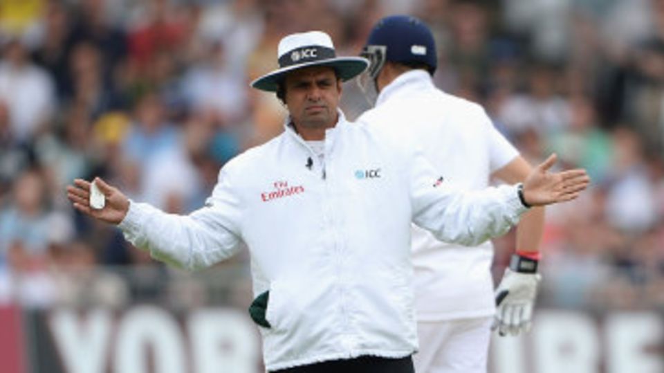 Aleem Dar signals a wide off the first ball of the series