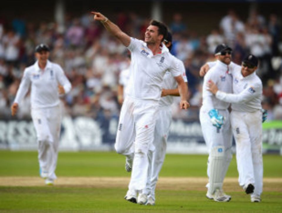 Anderson gestures to David Saker on the balcony at Trent Bridge after taking his advice to dismiss Chris Rogers with a cutter