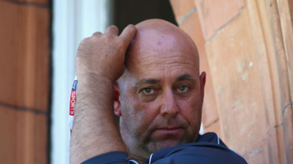 Tough job: Darren Lehmann watches Australia's performance