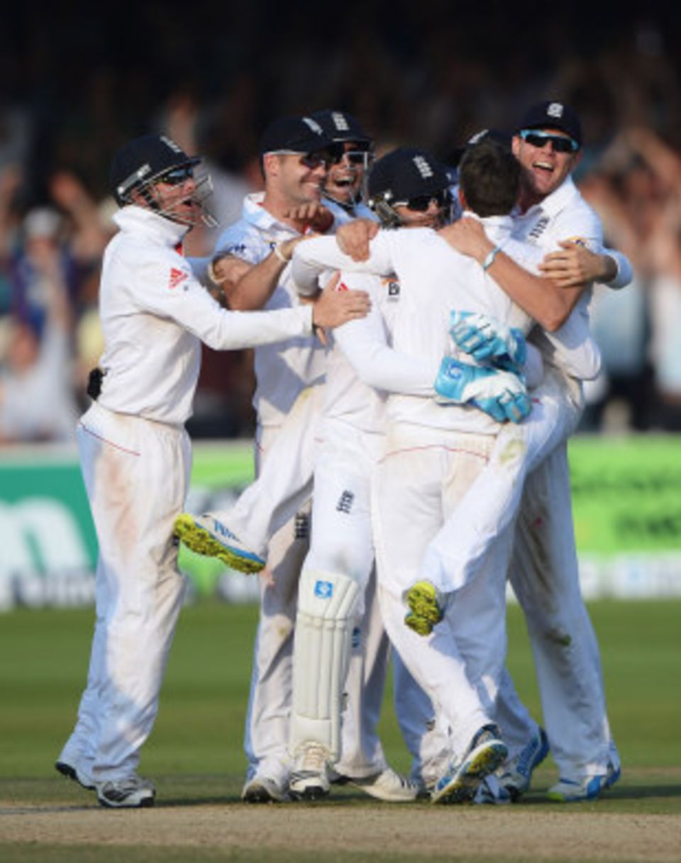 Graeme Swann is engulfed as England wrapped up a huge win at Lord's