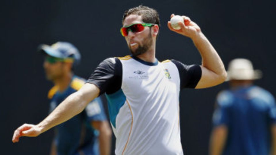 Wayne Parnell throws the ball during a drill at a practice session