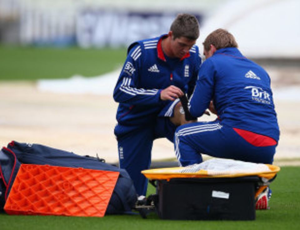 Overton receives treatment on a knee compliant during his spell with England in September