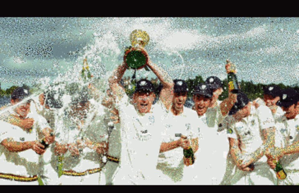 Paul Collingwood holds the Championship trophy