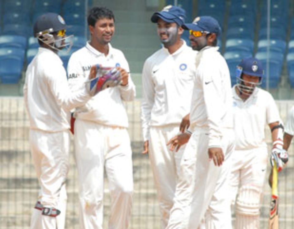 File photo: Pragyan Ojha took two wickets to help Hyderabad's chances of taking a first-innings lead over Goa