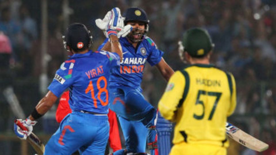 Rohit Sharma and Virat Kohli celebrate India's win