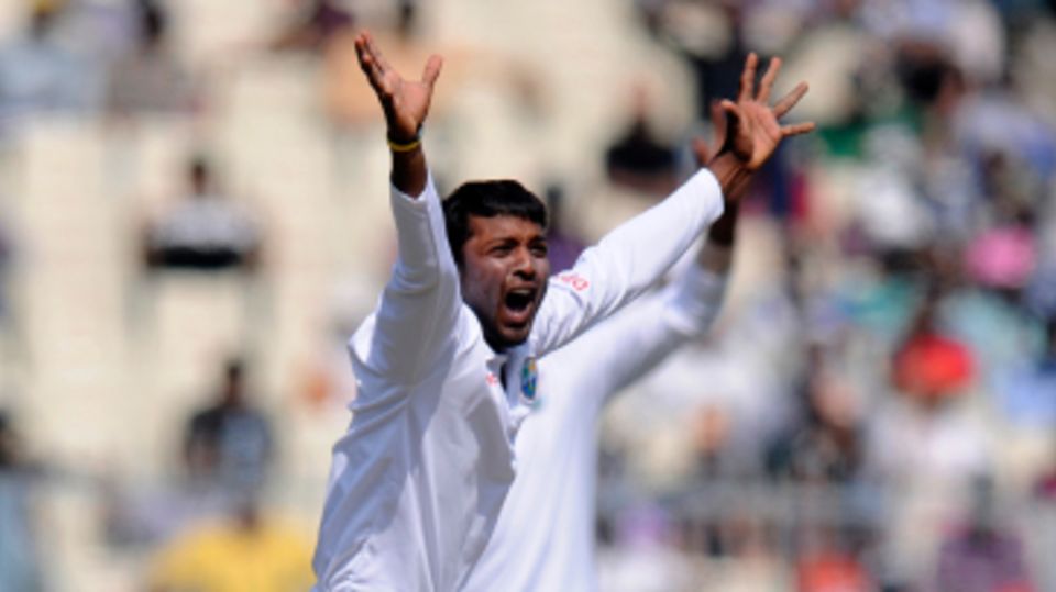 Veerasammy Permaul appeals successfully for Rohit Sharma's wicket