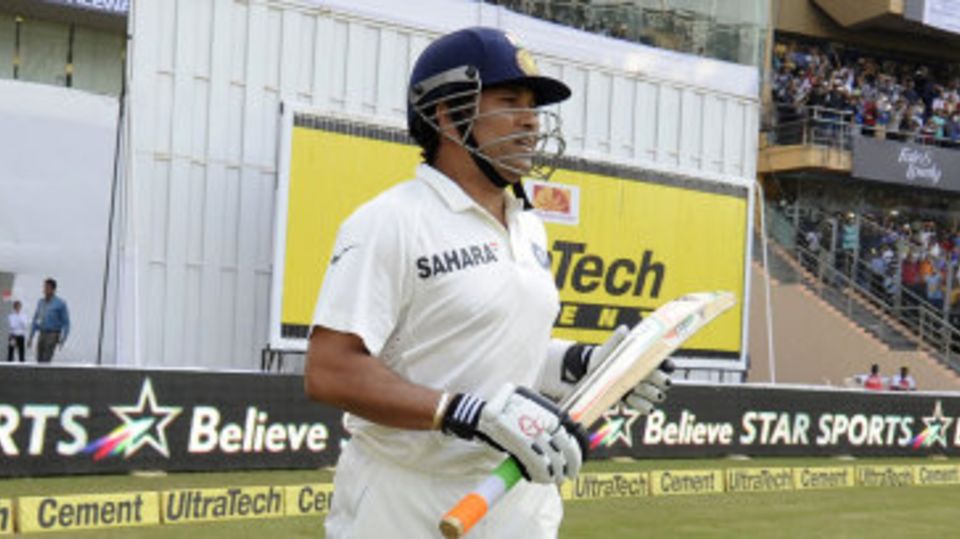 Sachin Tendulkar walks out to bat in his final Test