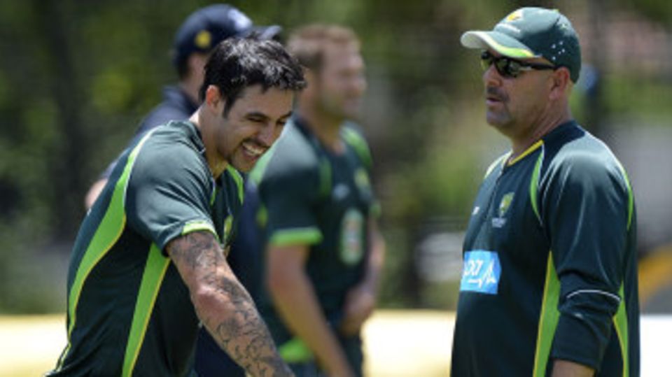 Darren Lehmann, sporting some extra facial hair, chats with Mitchell Johnson