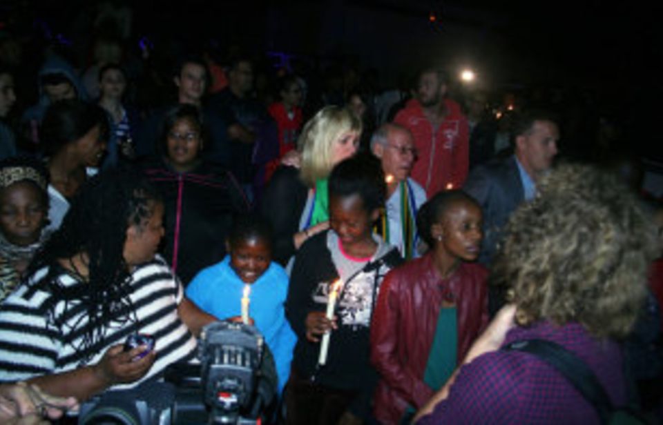 Not a time for mourning: there were candles, singing and dancing outside Nelson Mandela's house