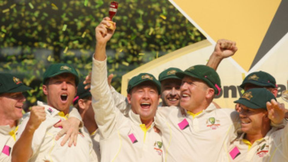 Michael Clarke gets his hands on the Ashes