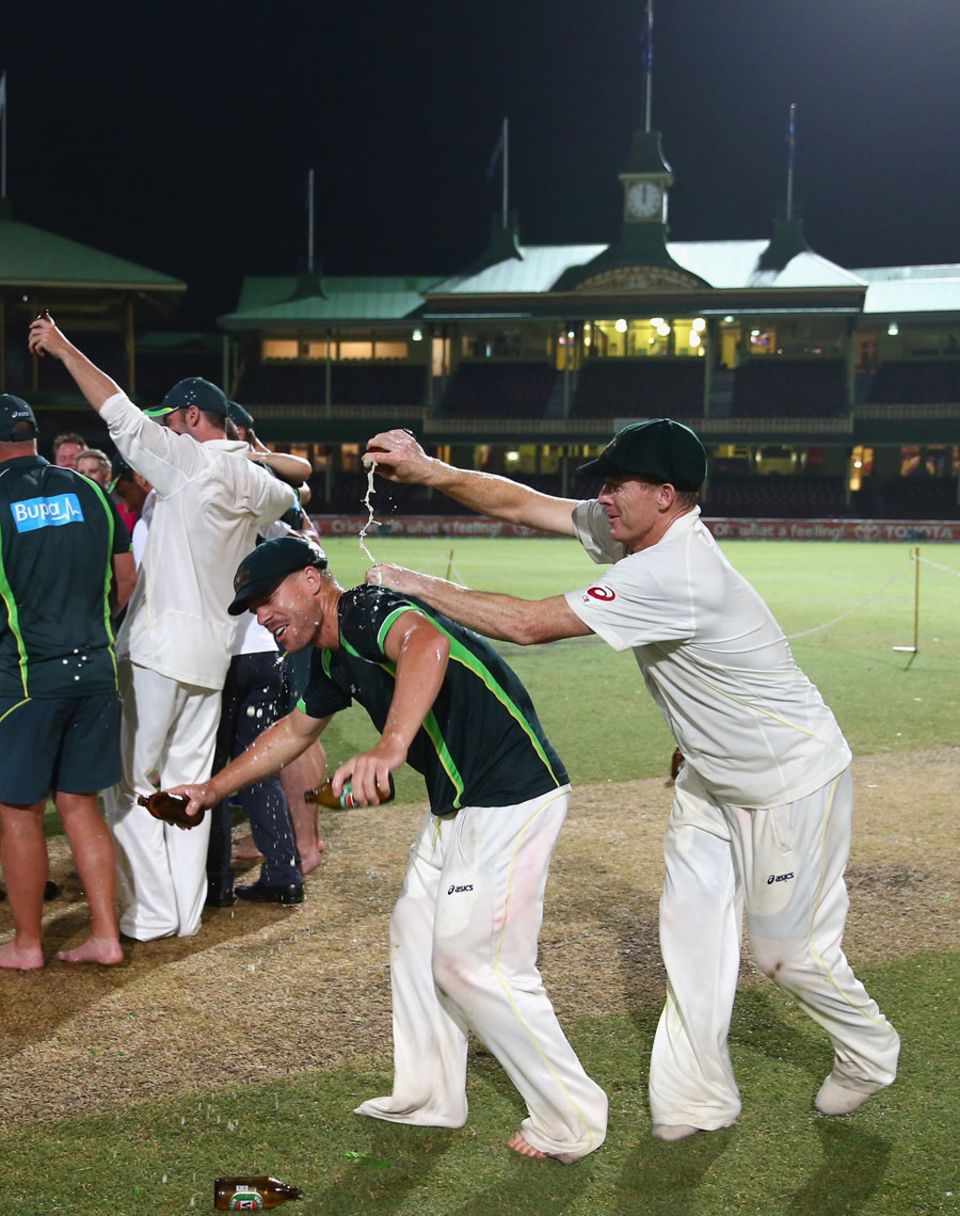 Chris Rogers playfully dumps beer on David Warner after Australia whitewashed England in the 2013-14 Ashes