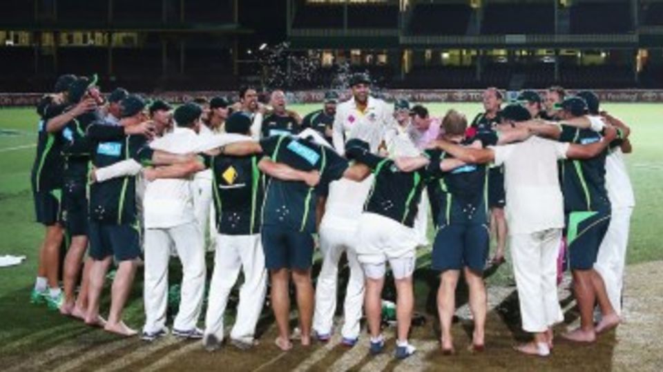 Nathan Lyon leads the singing of the team song