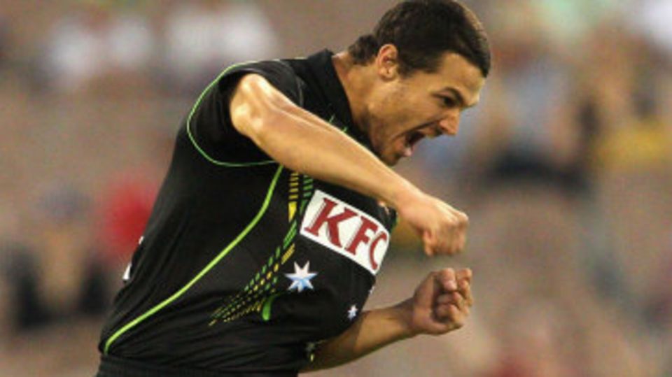 Nathan Coulter-Nile celebrates the wicket of Jos Buttler