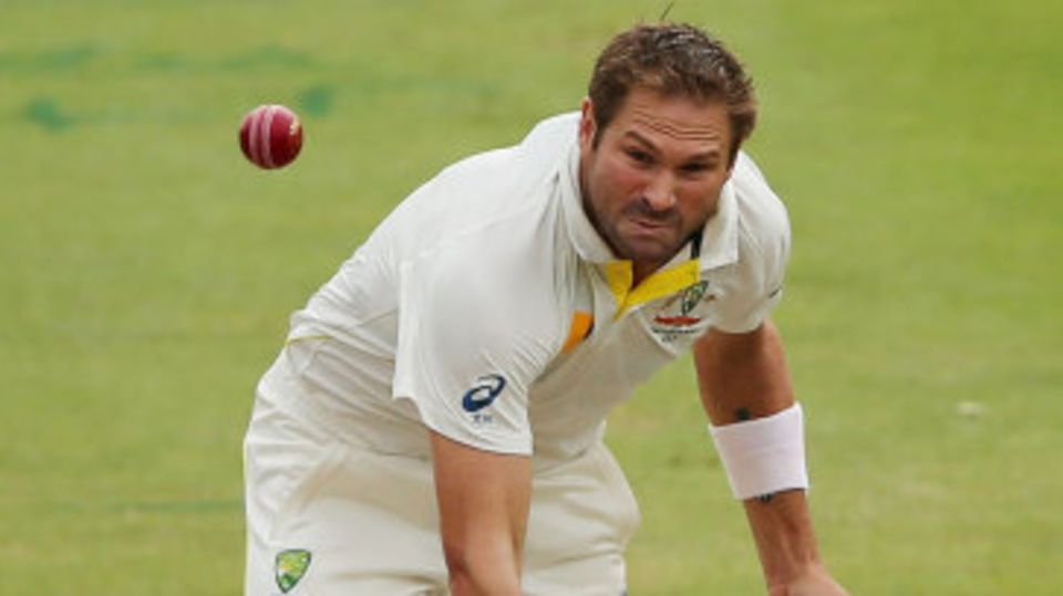 Ryan Harris fires down a delivery