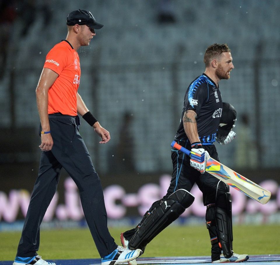 Brendon McCullum and Stuart Broad trudge off at the rain break, with New Zealand firmly in front
