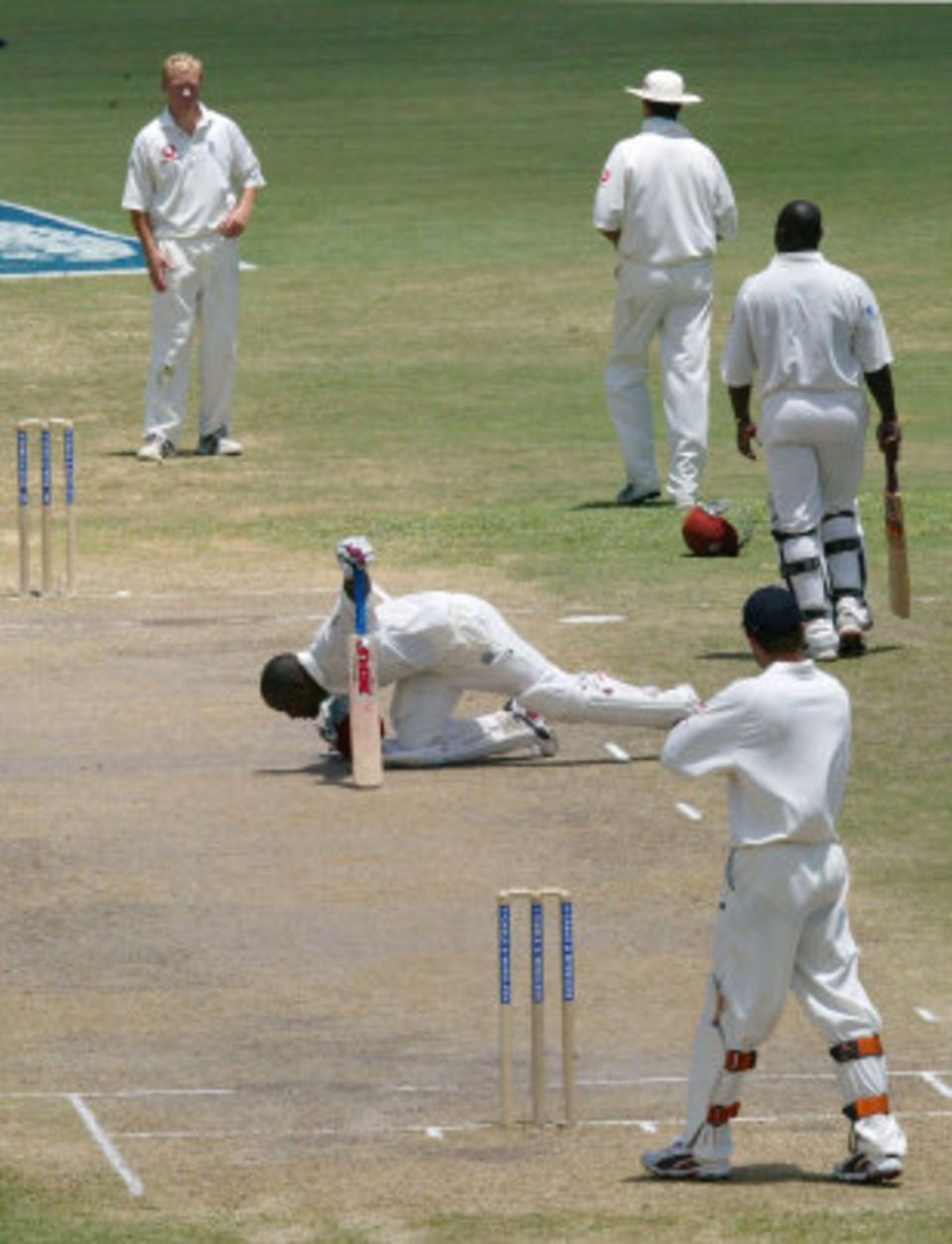 Lara kisses the pitch