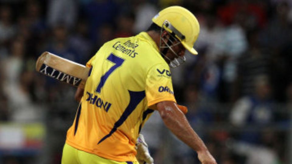 MS Dhoni collects a stump after hitting the winning runs