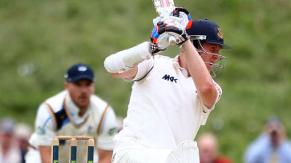 Luke Wells drives on his way to a half-century