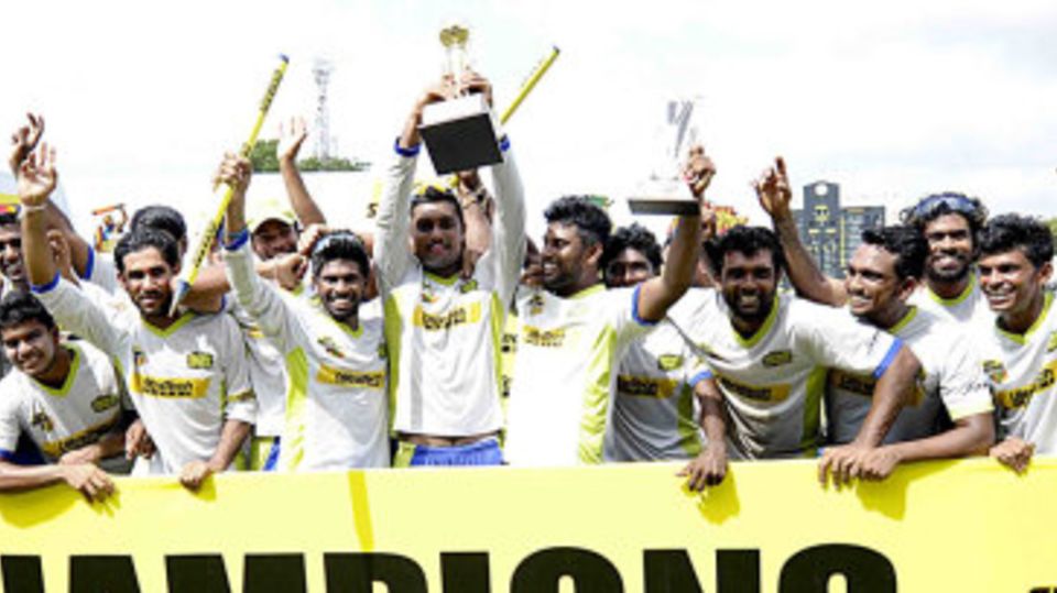 Southern Express players celebrate with the trophy