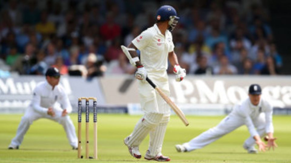 Gary Ballance gets down to the low catch to remove Shikhar Dhawan