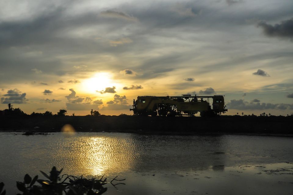 A maintenance engine rides on a newly built track over Elephant Pass