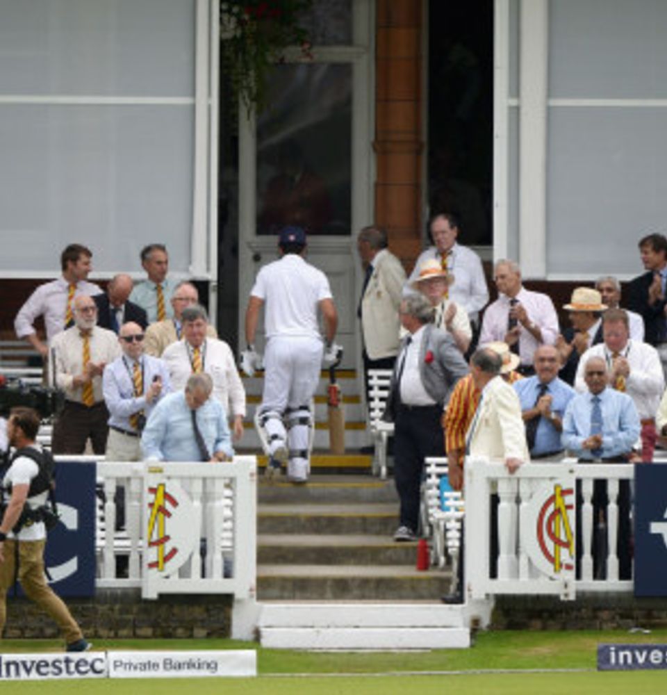 Some Lord's members avert their eyes as Alastair Cook returns to the pavilion