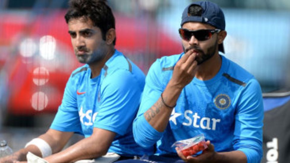 Gautam Gambhir and Ravindra Jadeja have a rest during India practice