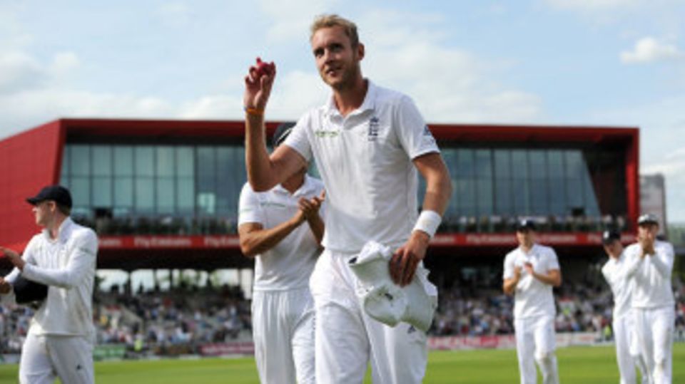 Stuart Broad leads his teammates off the field after finishing with six wickets