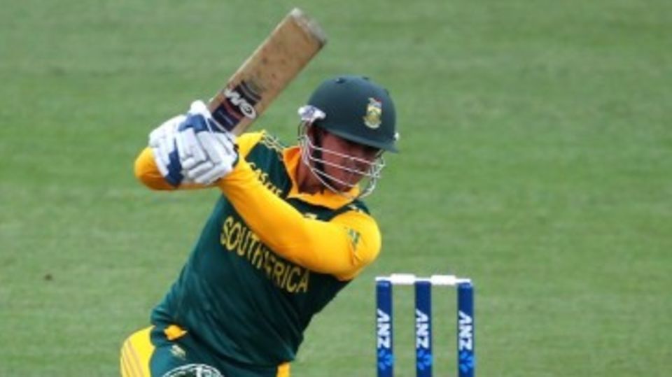 Quinton de Kock drives through the off side