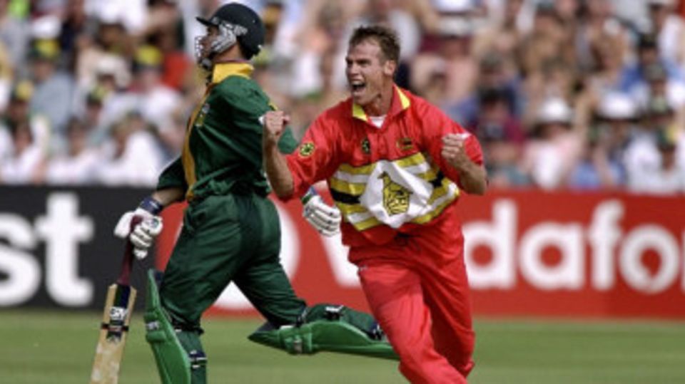 Neil Johnson celebrates a wicket