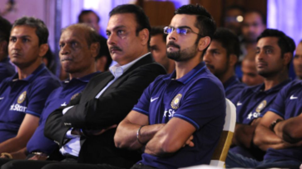 Virat Kohli and Ravi Shastri listen to VVS Laxman's lecture