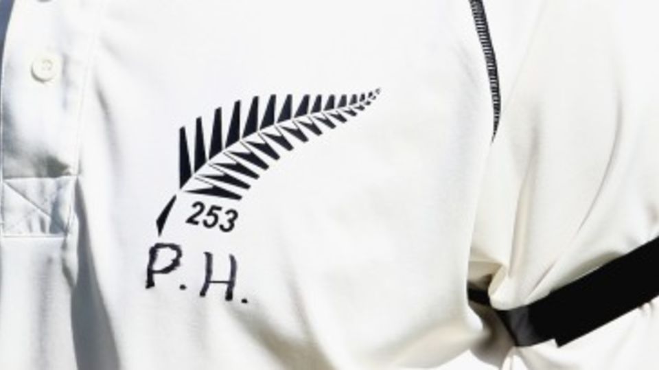 A New Zealand cricketer with Phillip Hughes' initials on his shirt