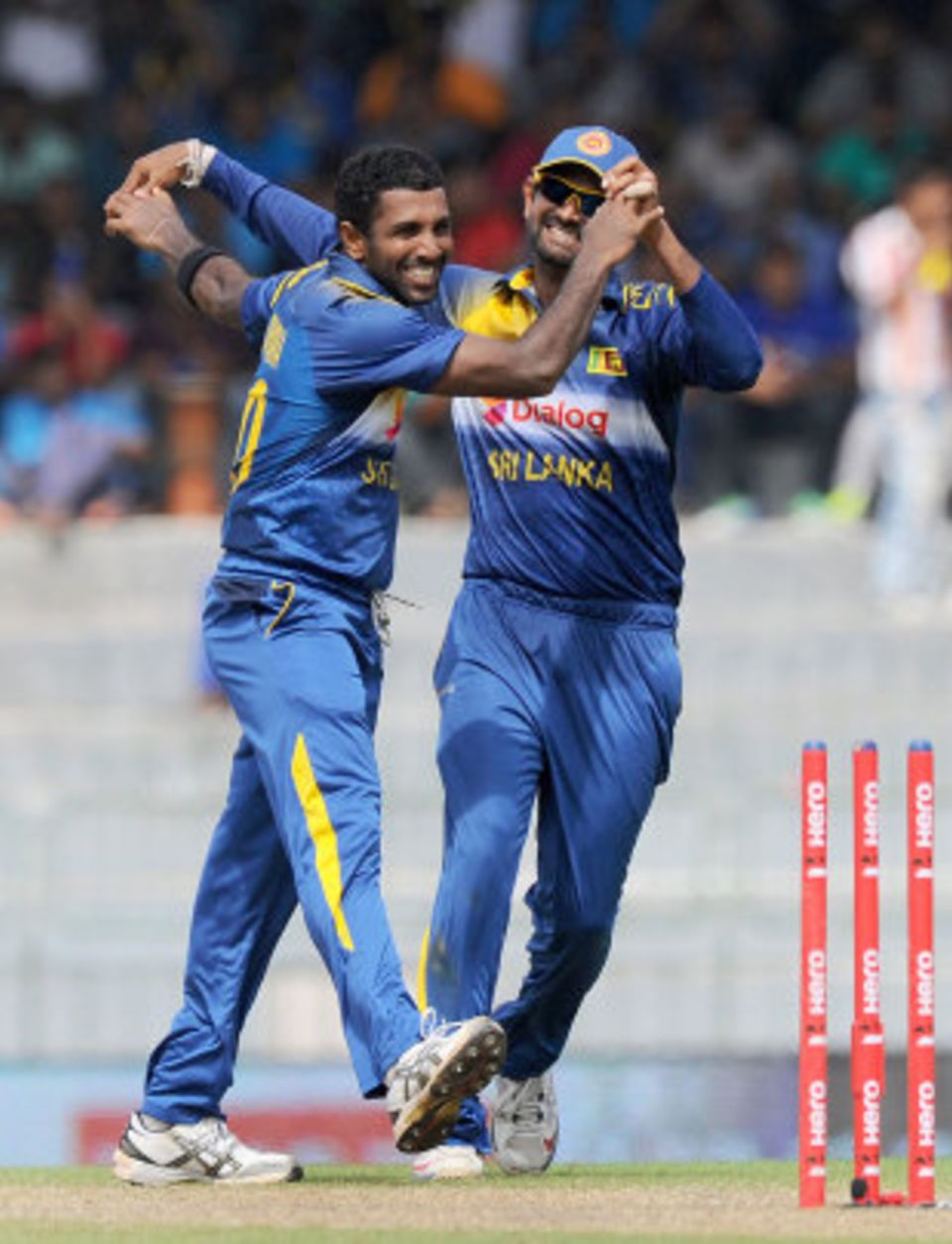 Dhammika Prasad kept his hold over Jos Buttler
