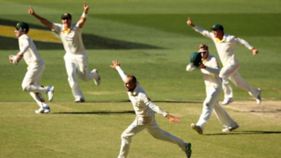 Nathan Lyon sets off in celebration after sealing Australia's win