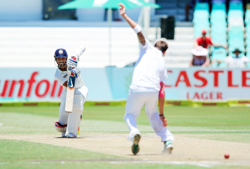 Last man driving: Rahane punches one down the ground off Dale Steyn on day five in Durban, 2013