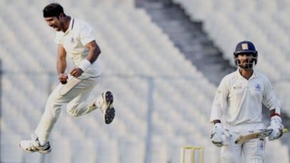 Ashok Dinda leaps after dismissing Dinesh Karthik for 92