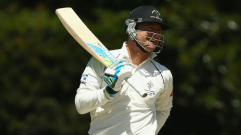 A happy Michael Clarke bats for his club Western Suburbs