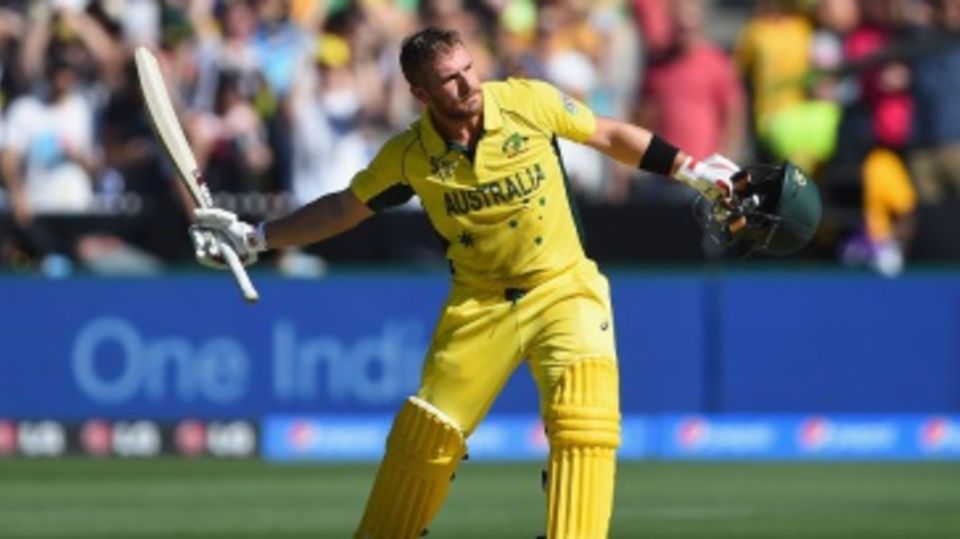 Aaron Finch celebrates after becoming the first centurion of World Cup 2015