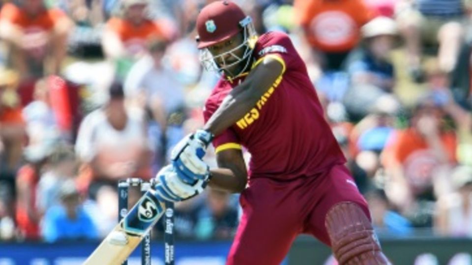 Andre Russell prepares to flay one through the off side