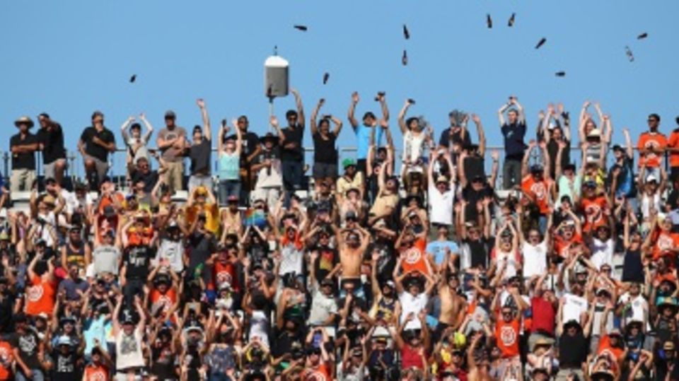 New Zealand fans belt out a wave for their team