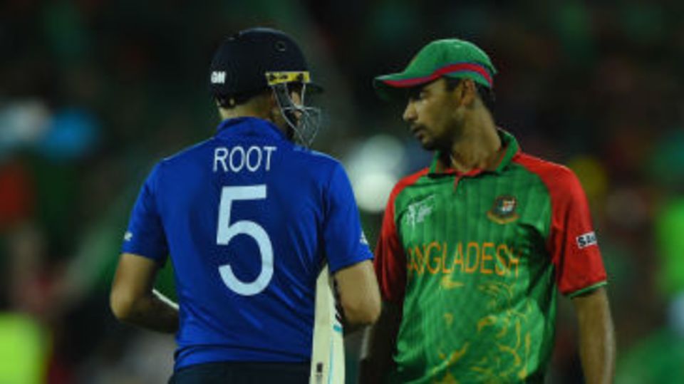 Mashrafe Mortaza and Joe Root exchange a few words after Ian Bell's dismissal