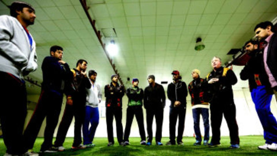 Coach Andy Moles talks to Afghanistan's players