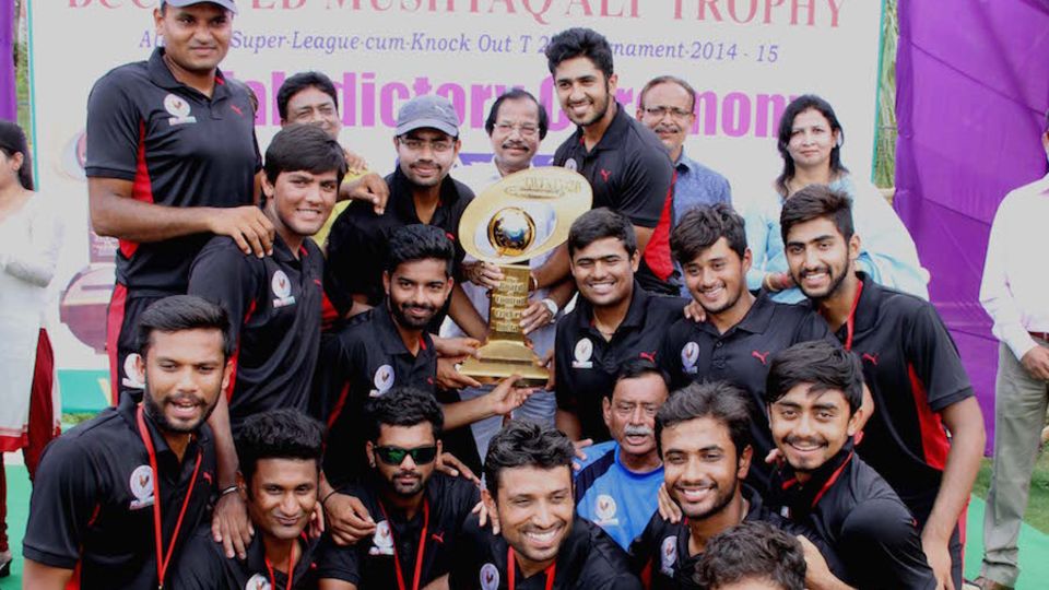 The Gujarat team poses with the Syed Mushtaq Ali trophy