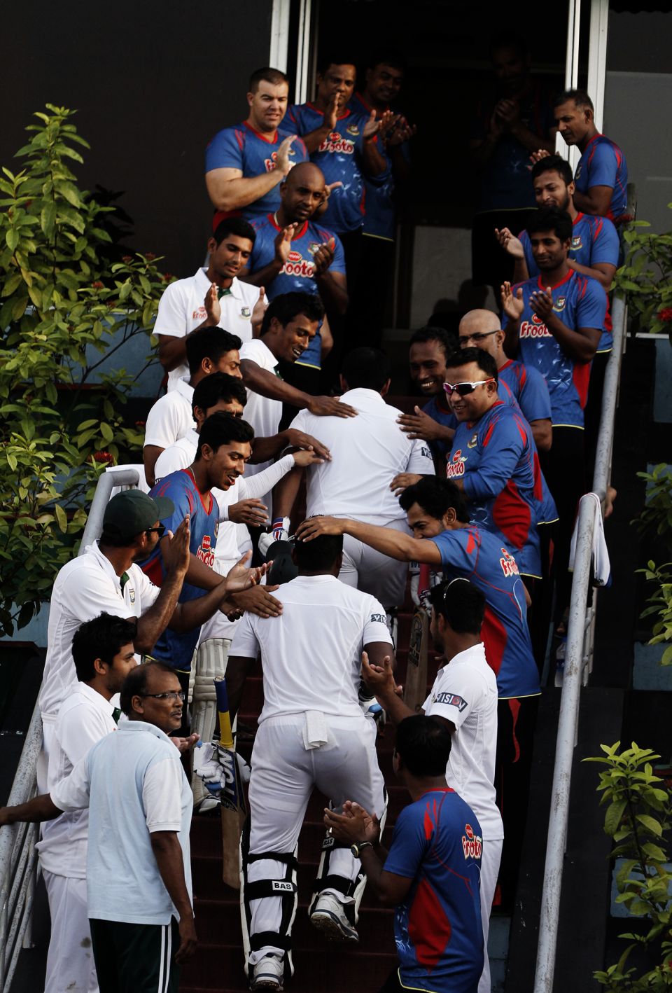 Players congratulate Imrul Kayes and Tamim for their record opening partnership in Khulna against Pakistan in 2015