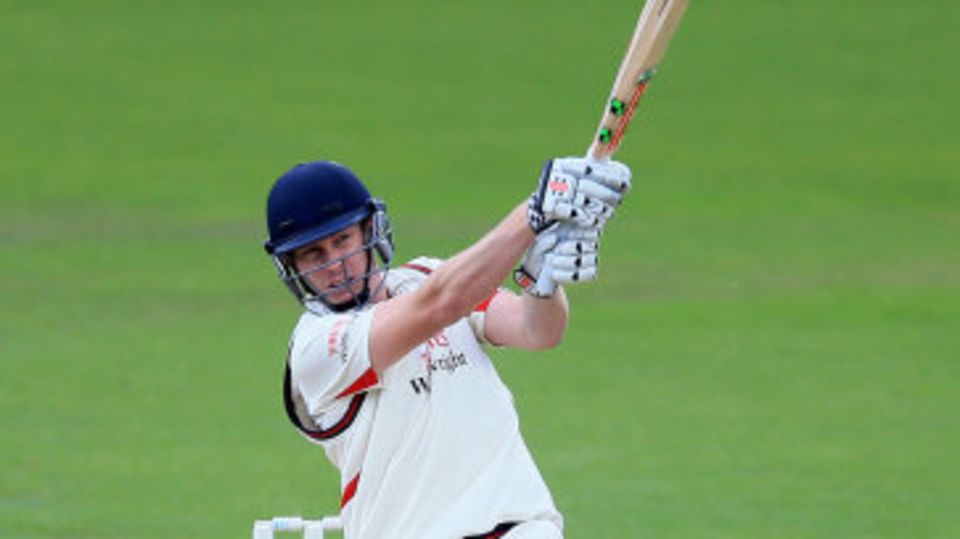 James Faulkner drives down the ground during his maiden first-class hundred