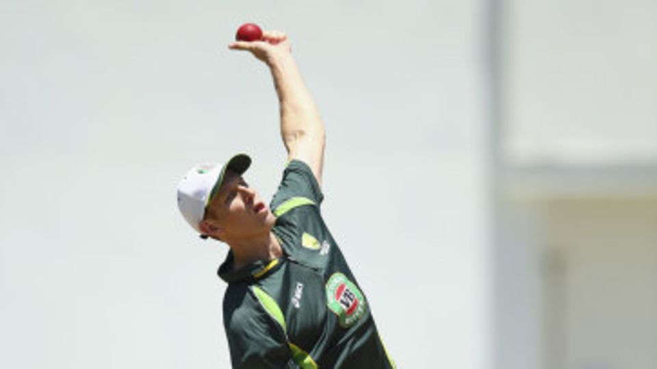 Adam Voges sends down his left-arm spin