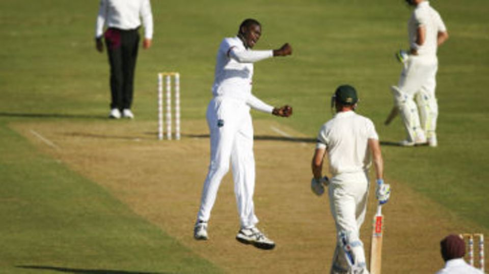 Jason Holder exults after dismissing Shaun Marsh