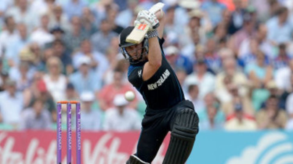 Kane Williamson comes forward into a cover drive