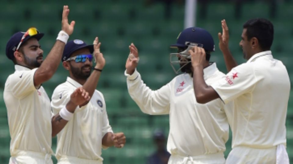 R Ashwin is congratulated by team-mates after he dismissed Shakib Al Hasan