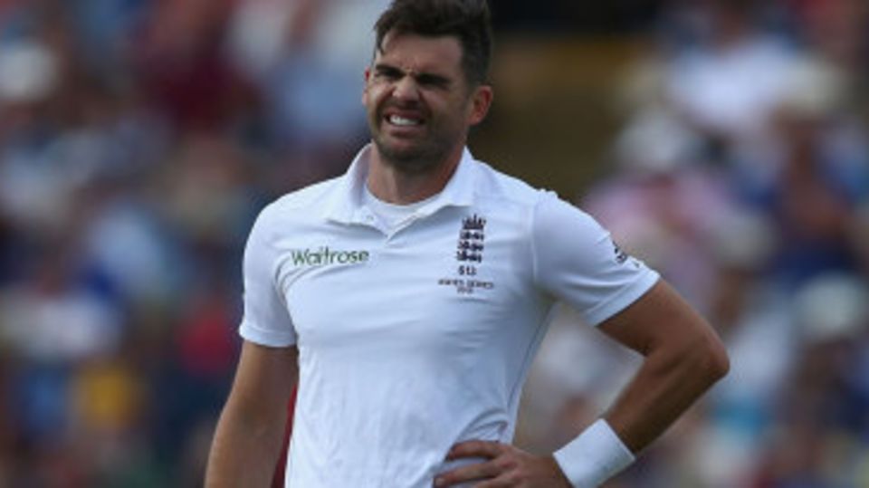 James Anderson left the field after feeling his side